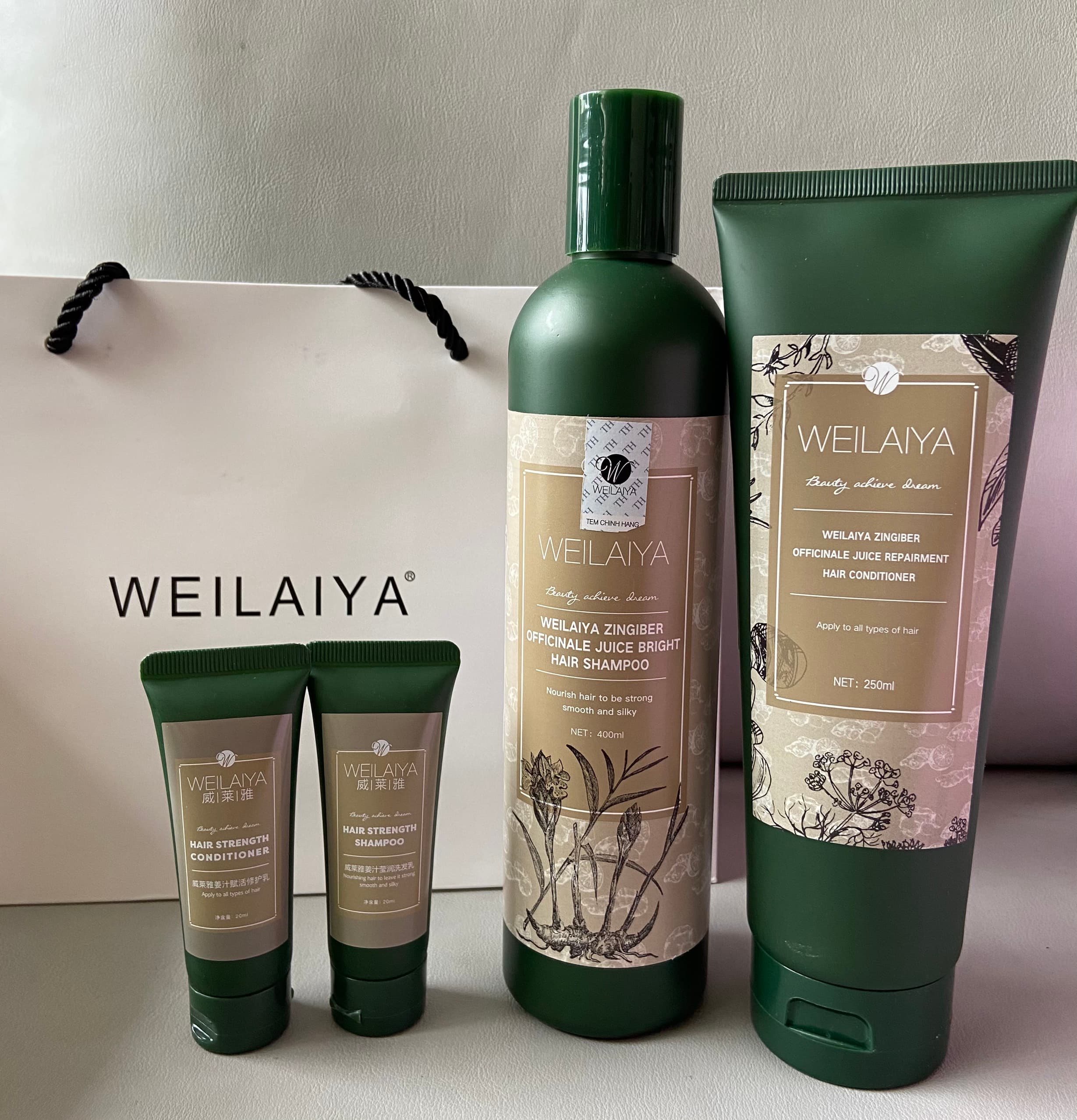 Cặp Dầu gội gừng hà thủ ô Weilaiya 100% từ thiên nhiên (tem nâu ) tặng kèm bộ mini